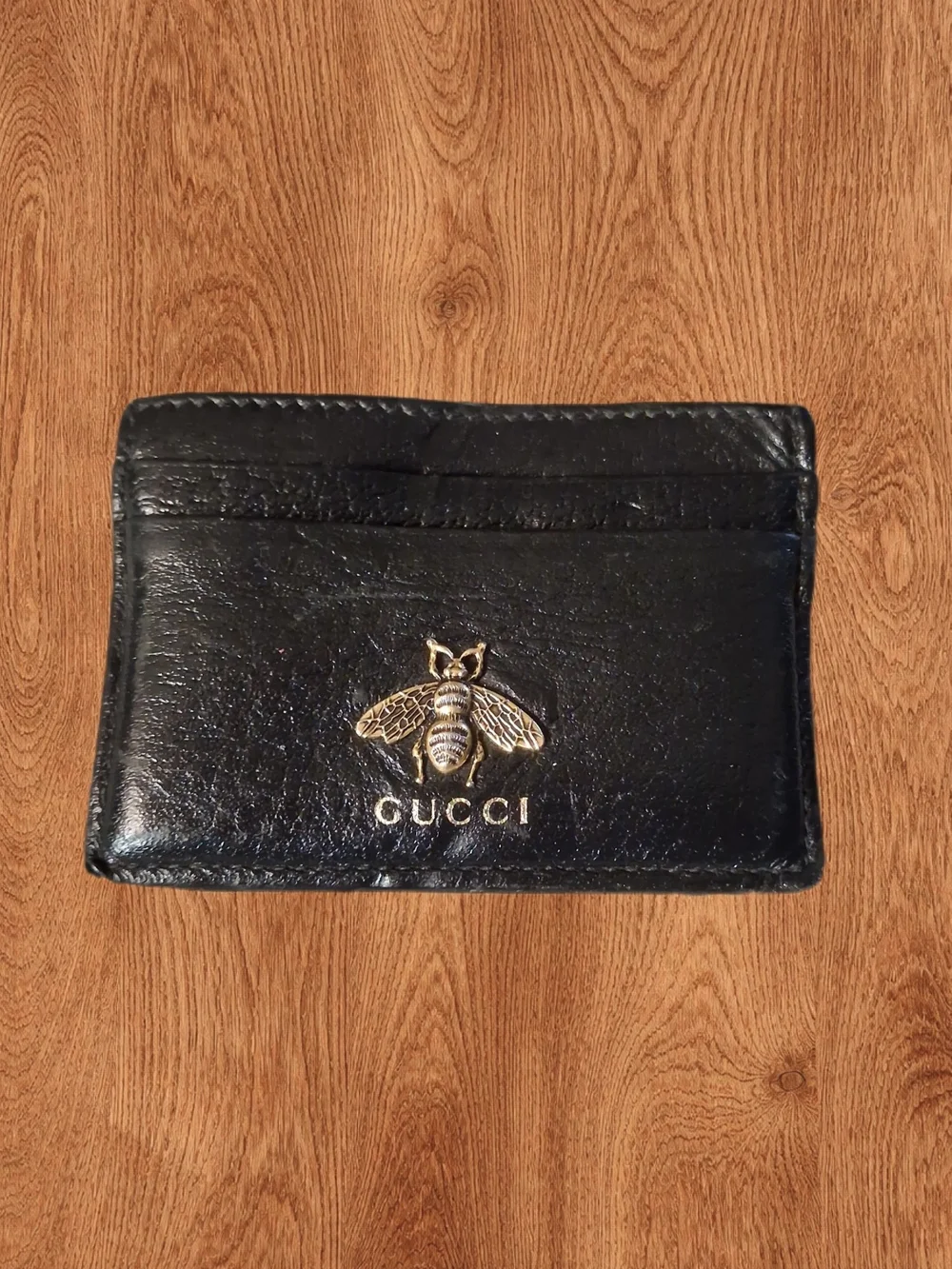 Gucci Black Leather Card Sleeve with Gold Bee Motif